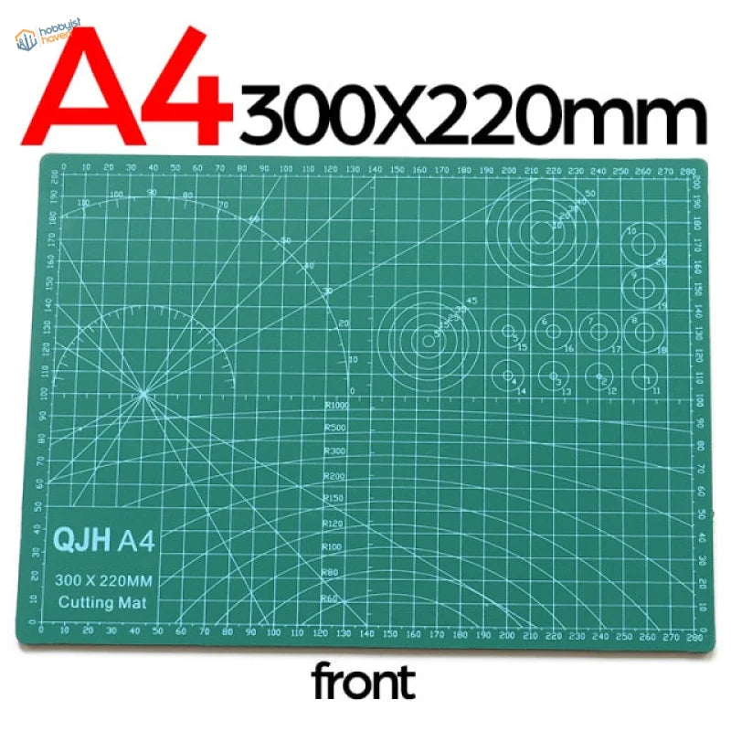 Green A4 self-healing cutting mat with grid and circle markings