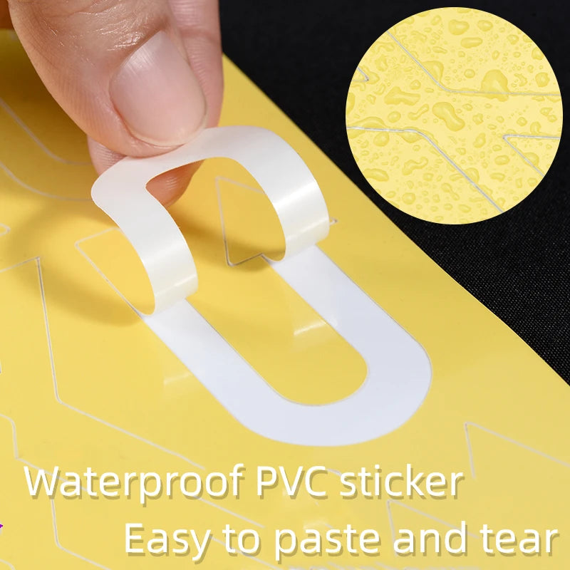 Peeling a self-adhesive PVC road marking sticker