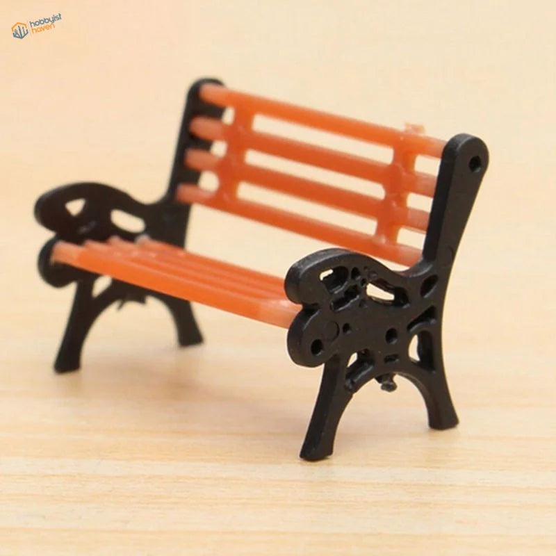 Black and orange detailed bench for rail transport modeling
