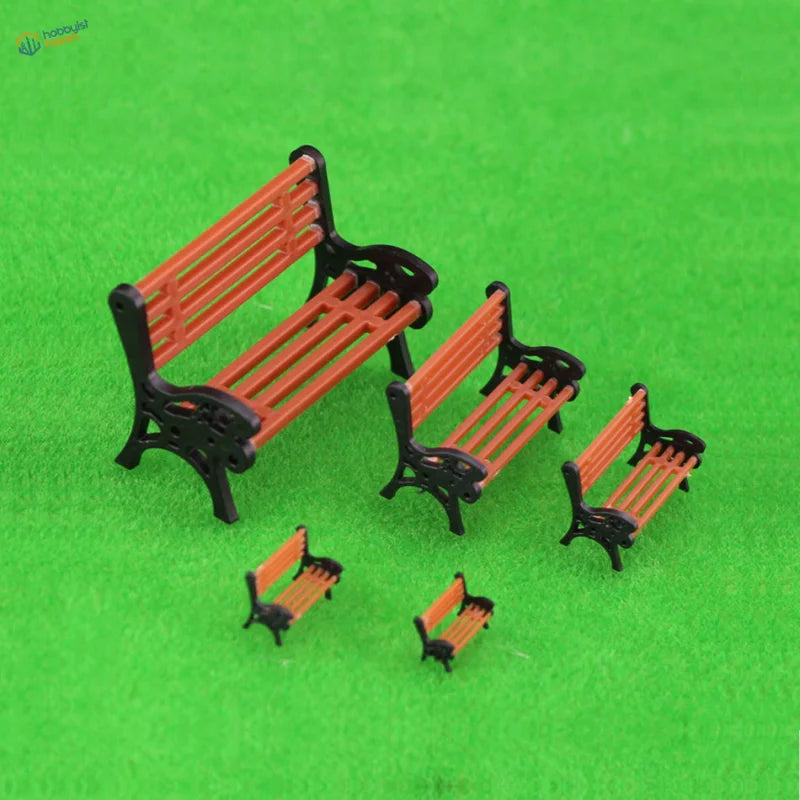 Set of 4 detailed benches for rail transport modeling, black iron frames, orange slats