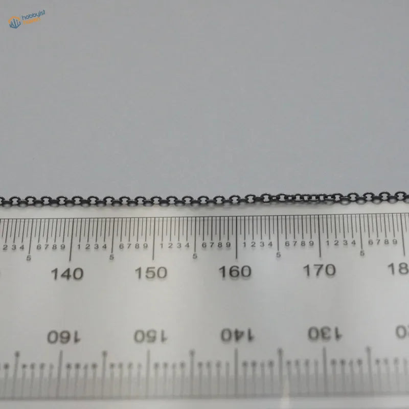 Black metal anchor chain with sleek uniform link design for model ships showcasing durable metal anchor chain quality