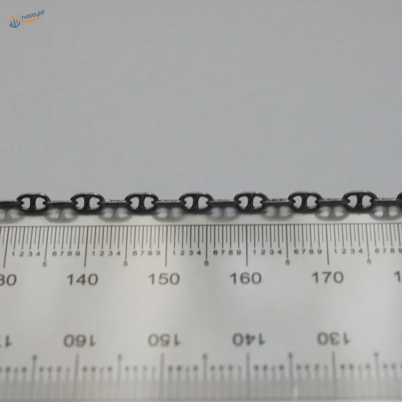 Black metal anchor chain with sleek interlocking design for model ships made of durable metal anchor chain material