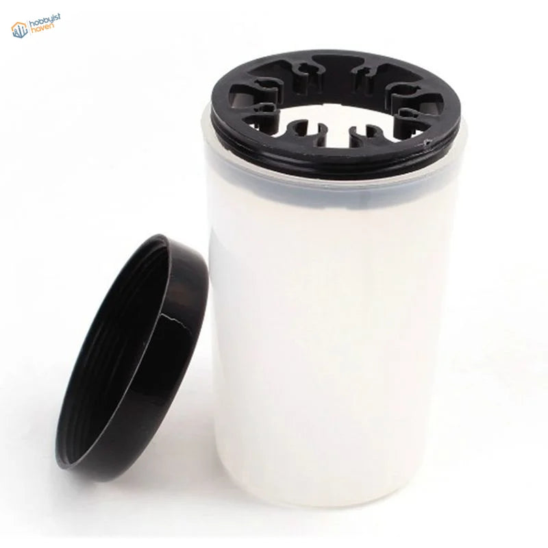 Transparent brush cleaning bottle with black ridged lid and curler slots