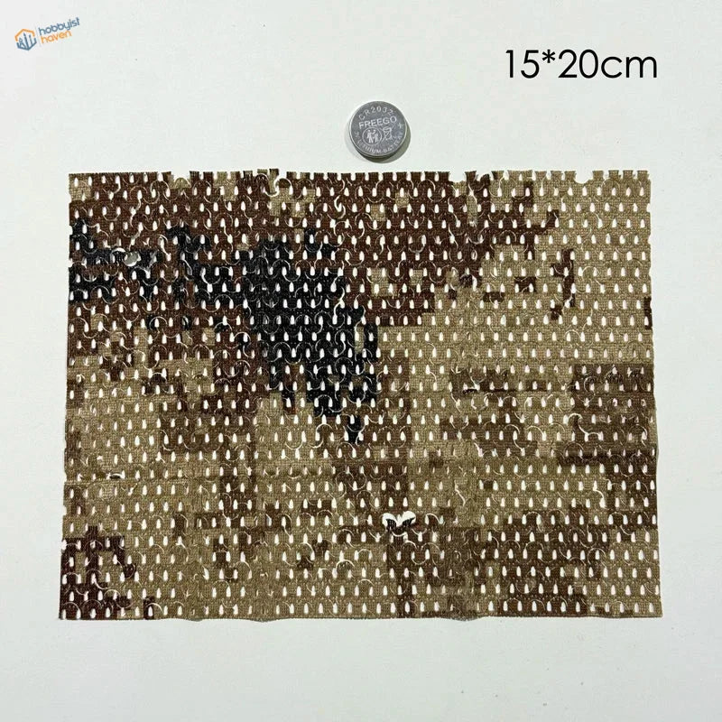Camouflage netting fabric for scale dioramas featuring flexible cloth with brown digital camouflage and chain-like motifs