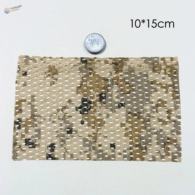 Rectangular camouflage netting fabric in beige brown and black textured flexible cloth for train layouts and scale dioramas