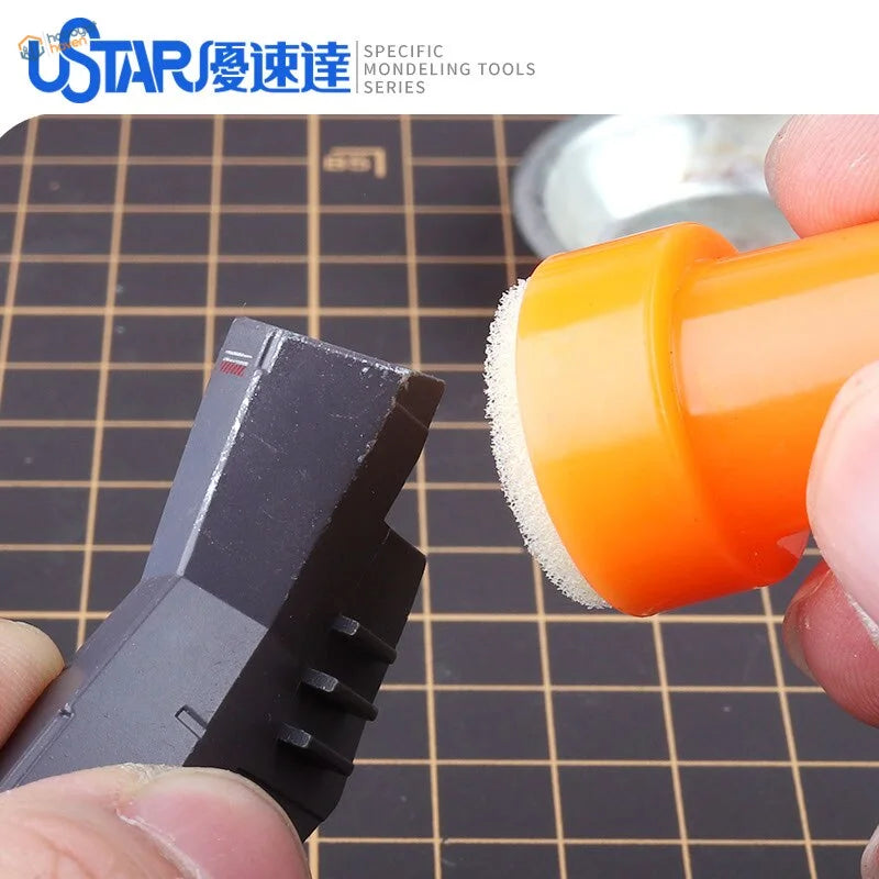 Orange foam sponge brush for scale modeling chipping and weathering