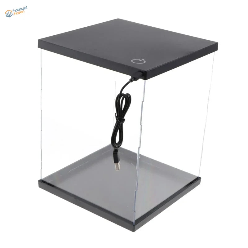 Clear acrylic display box with black frame, LED lights and USB cable