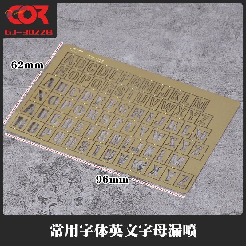 Gold Cormake numeric stencils with embossed uppercase letters grid