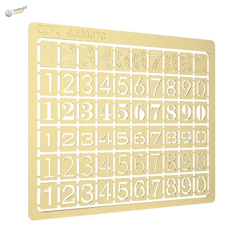 Gold Cormake numeric stencils with 5 rows of 10 cut-out numerals for scale modeling