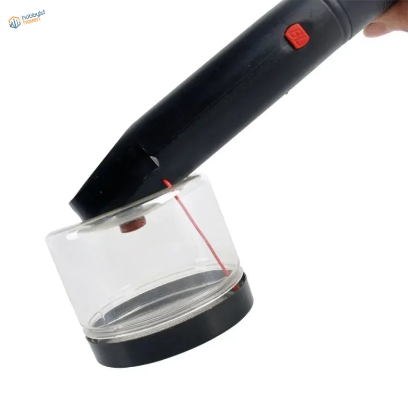 Black Cormake static grass applicator vacuum with transparent dust bin