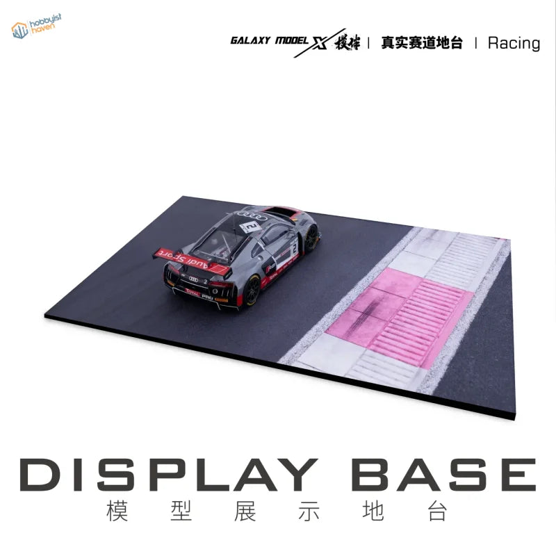 Gray and red Audi R8 LMS 1/24 scale model on display base with aluminum alloy frame