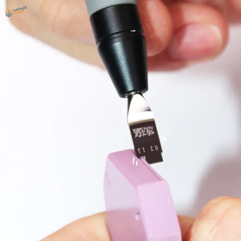 Professional tungsten scraper engraving panel lines on pink block