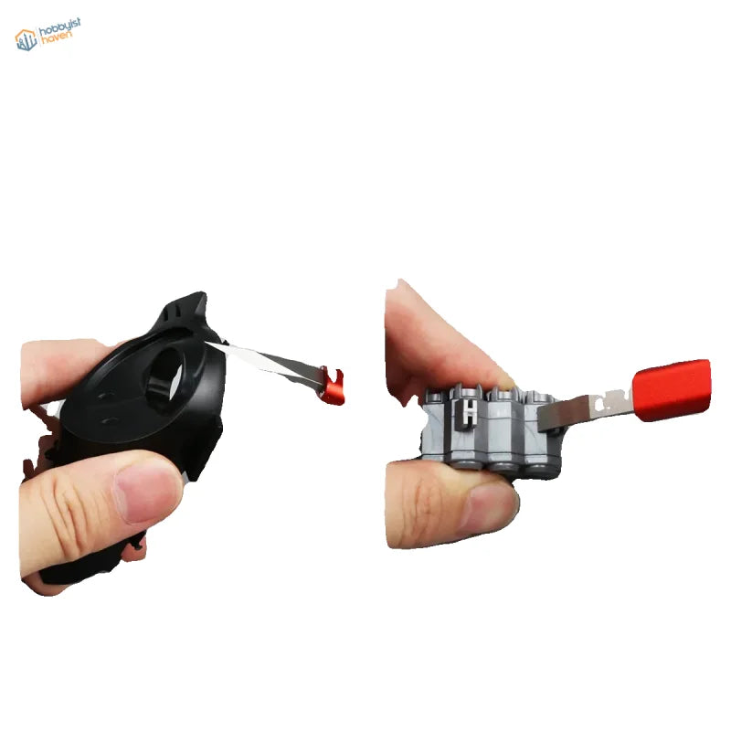 Dspiae Broad Edge Push Knife with black silver Lego-style blocks red handles