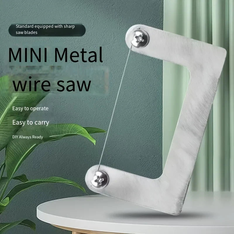 Silver mini wire saw with sharp taut metal blade designed for scale modeling tools and model building tools