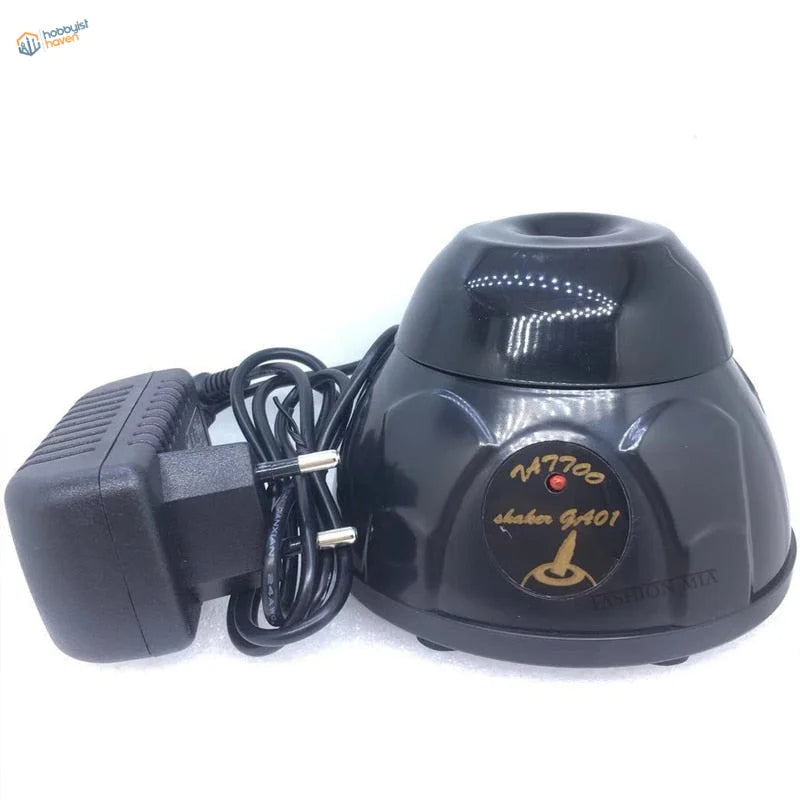 Black glossy Nattoo GA01 electric paint vortex shaker with emblem and red light