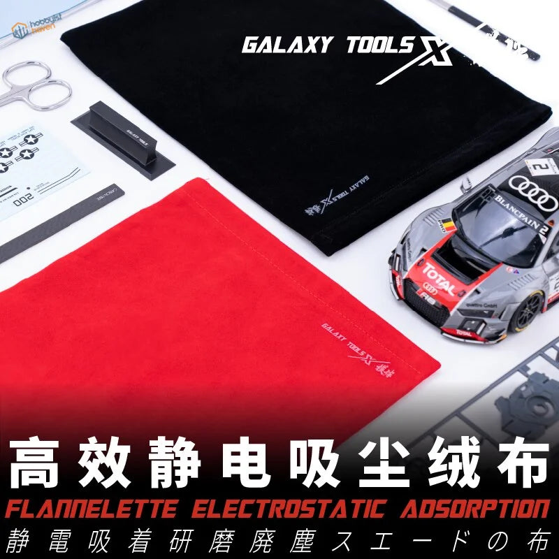 Silver and red Audi scale modeling car on electrostatic cloth for sanding dust