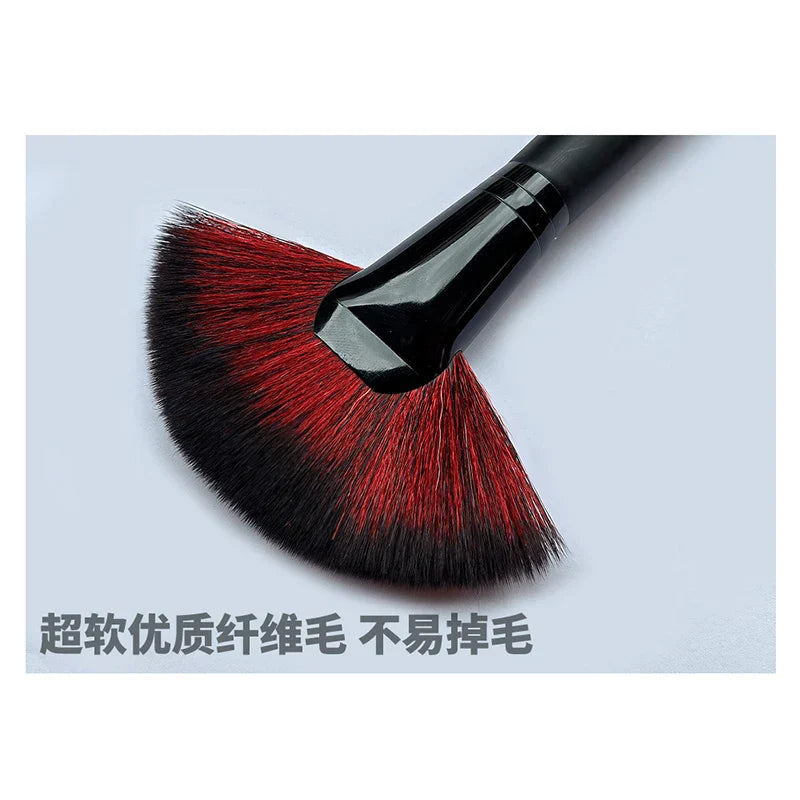 Soft fan model cleaning brush with sleek black handle and red-black bristles