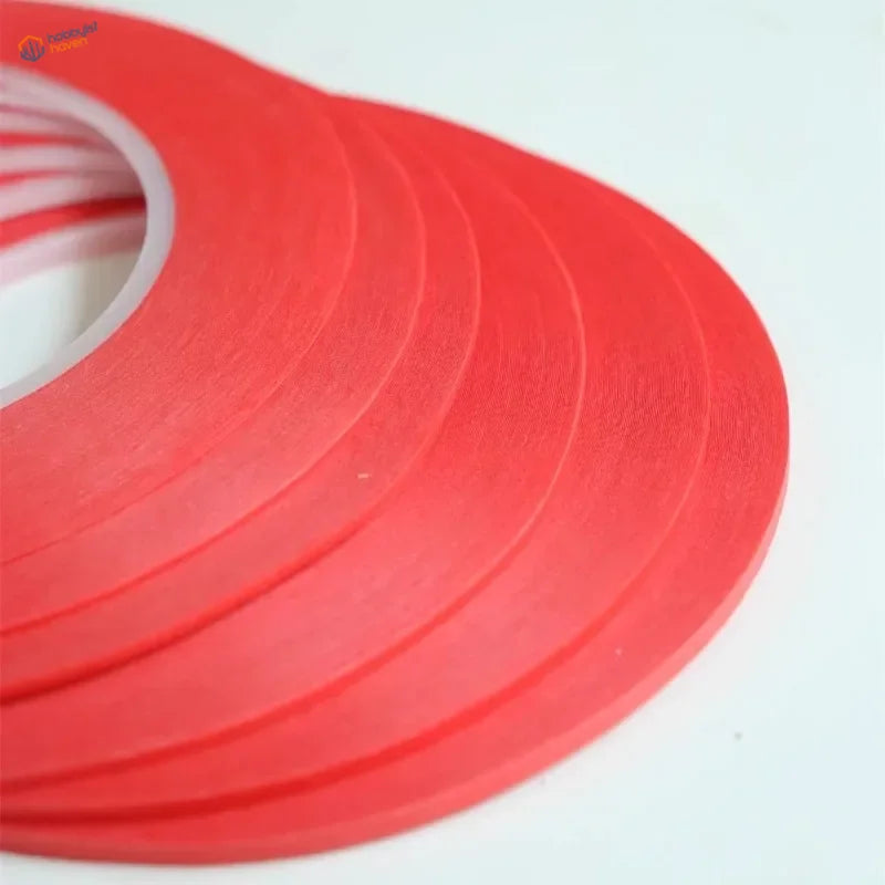 Fine line masking tape roll in red with white core designed for precise use in scale modeling tools and model building tools