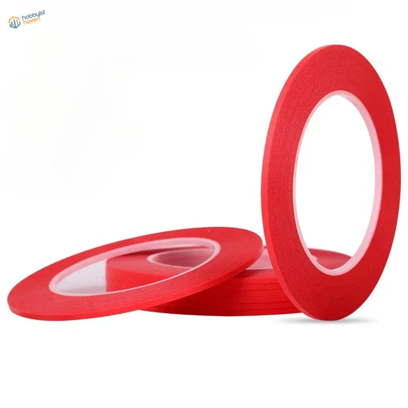 Red fine line masking tape rolls with clear backing for precise scale modeling and model building tools use