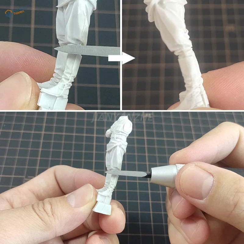 Carving tool detailing a white plastic figure
