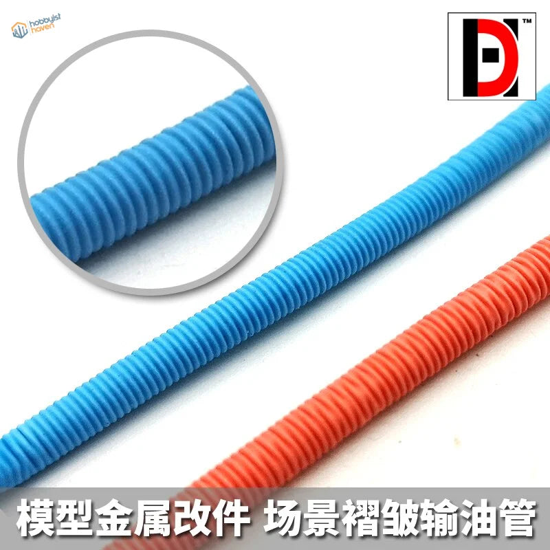 Blue and orange flexible oil pipes with ribbed corrugated texture for Gundam