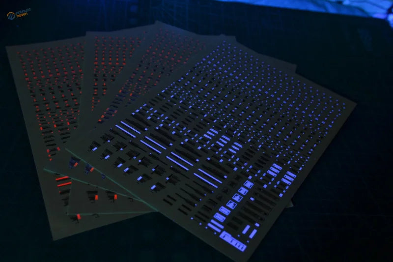 Fluorescent decals with glowing blue and red laser-cut patterns for HG/MG Gunplas