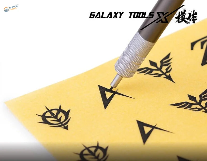 Galaxy 360 rotating blade pen engraving tribal logos on yellow paper
