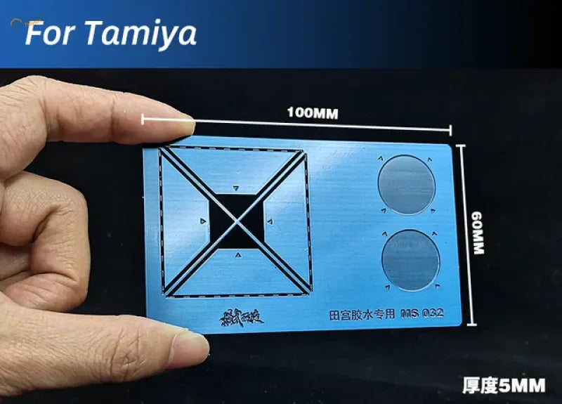 Blue metallic gluing stand for Tamiya scale modeling with grid and cutouts