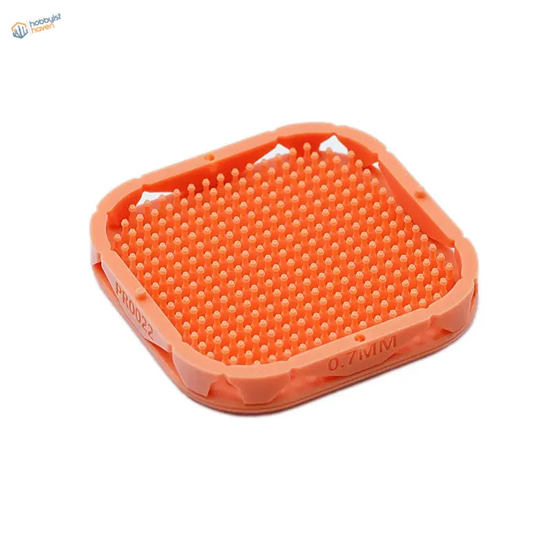 Orange plastic pet mat with printed recessed hex flange rivets grid