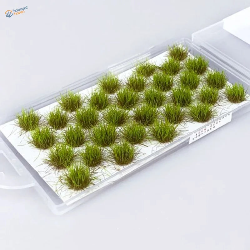 36 green grass flower patches in clear plastic container for scenery models
