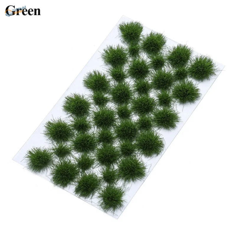 Green fluffy miniature grass tufts on clear sheet for grass flower patches