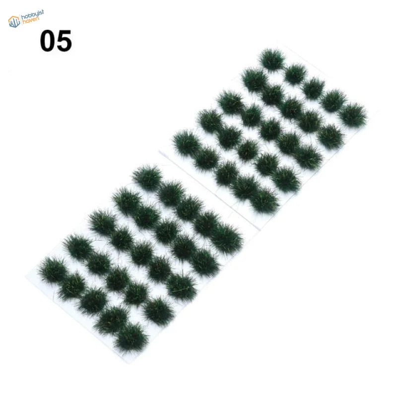 Dark green fuzzy grass flower patches on clear adhesive sheets
