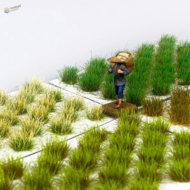 Mini figurine with grass flower patches, straw hat, bamboo basket back view