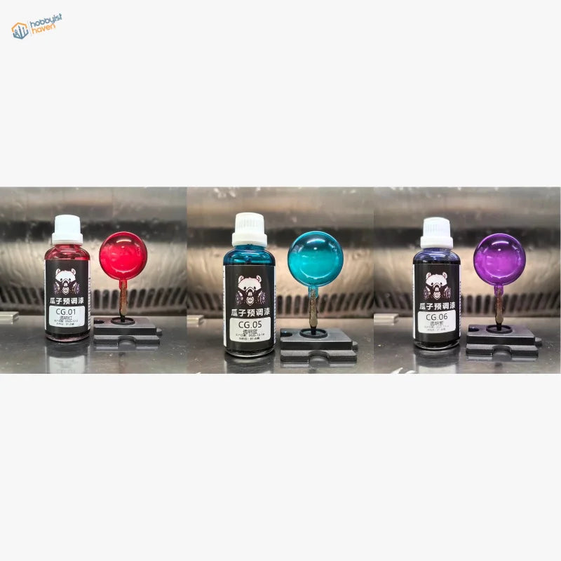 Candy Trio set of three 50ml transparent model paints in red, blue and purple with cured sample spheres