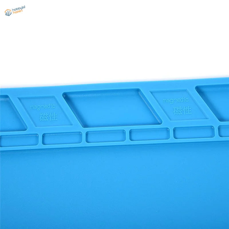 Blue silicone desk mat with magnetic organizer for soldering iron