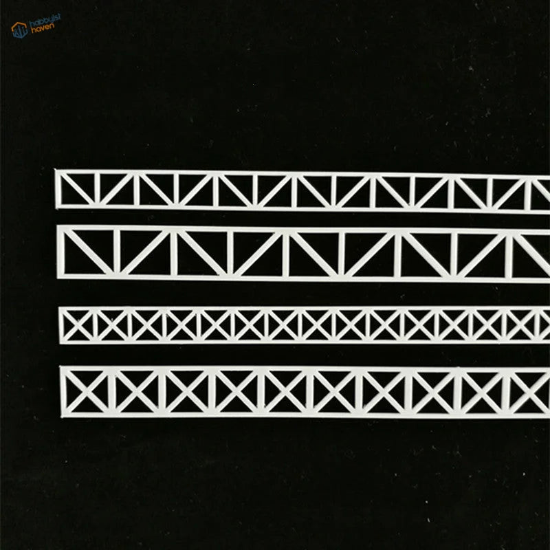 Ho scale steel bridge structure with white metal truss triangle die cuts