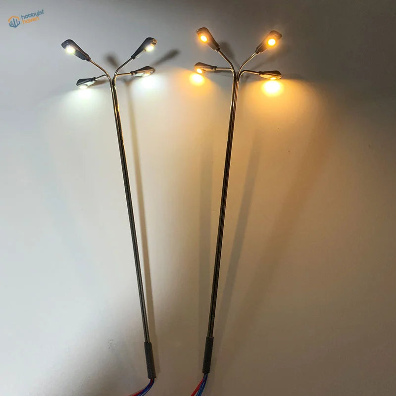 Ho scale LED street lamps with slender poles and glowing LEDs for dioramas