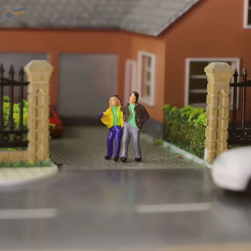 HO scale people figures set with yellow jacket and green shirt miniatures