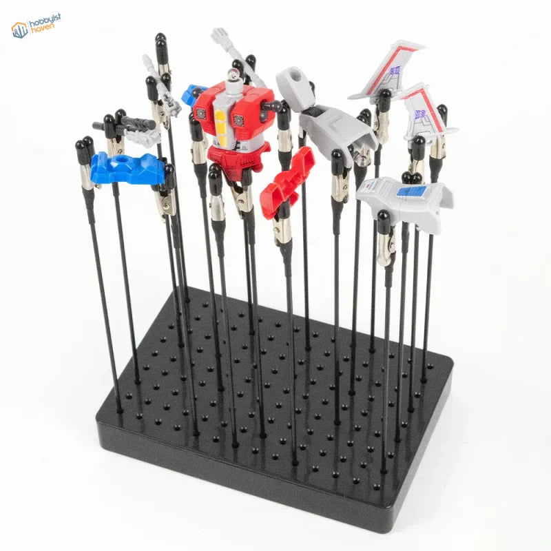 Holder with 20 magnetic alligator clips holding colorful toy robot parts