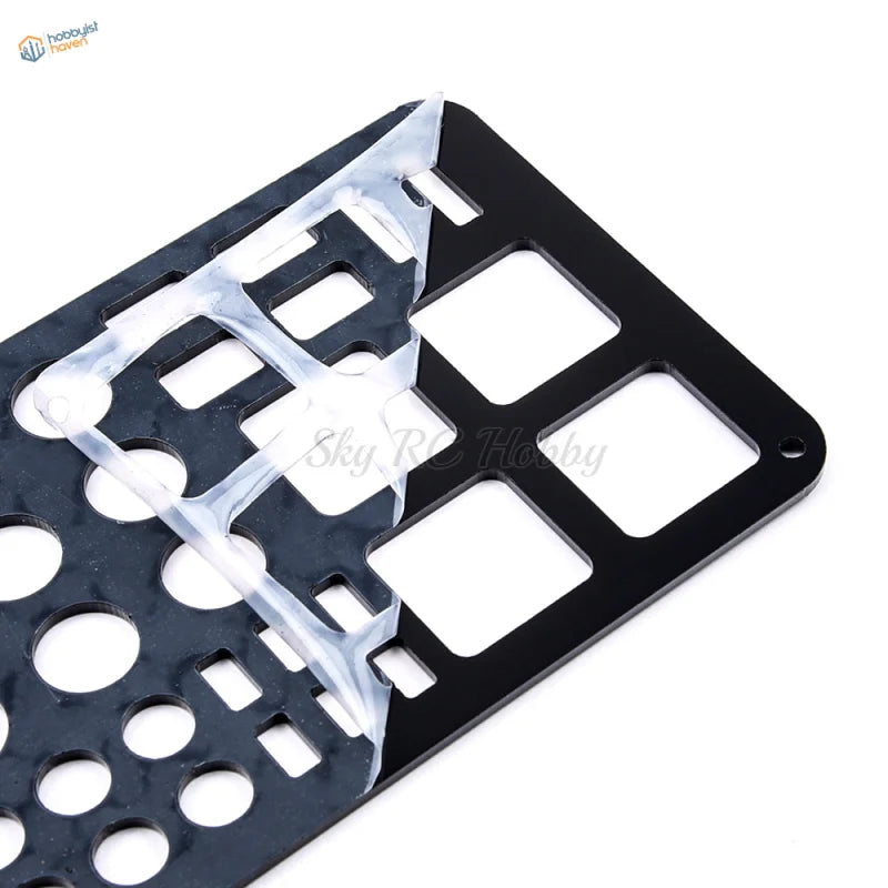 Black matte holding shelf with 63 holes for scale modeling tools organized