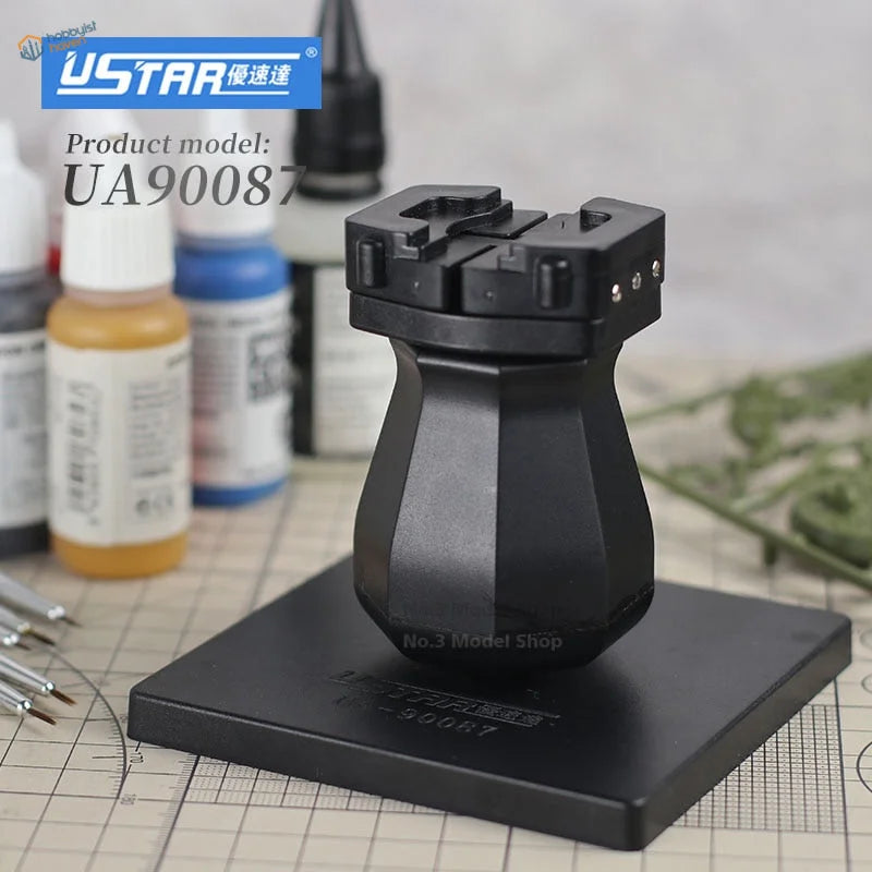 Black plastic Ustar UA90087 figure painting holder with hexagonal base