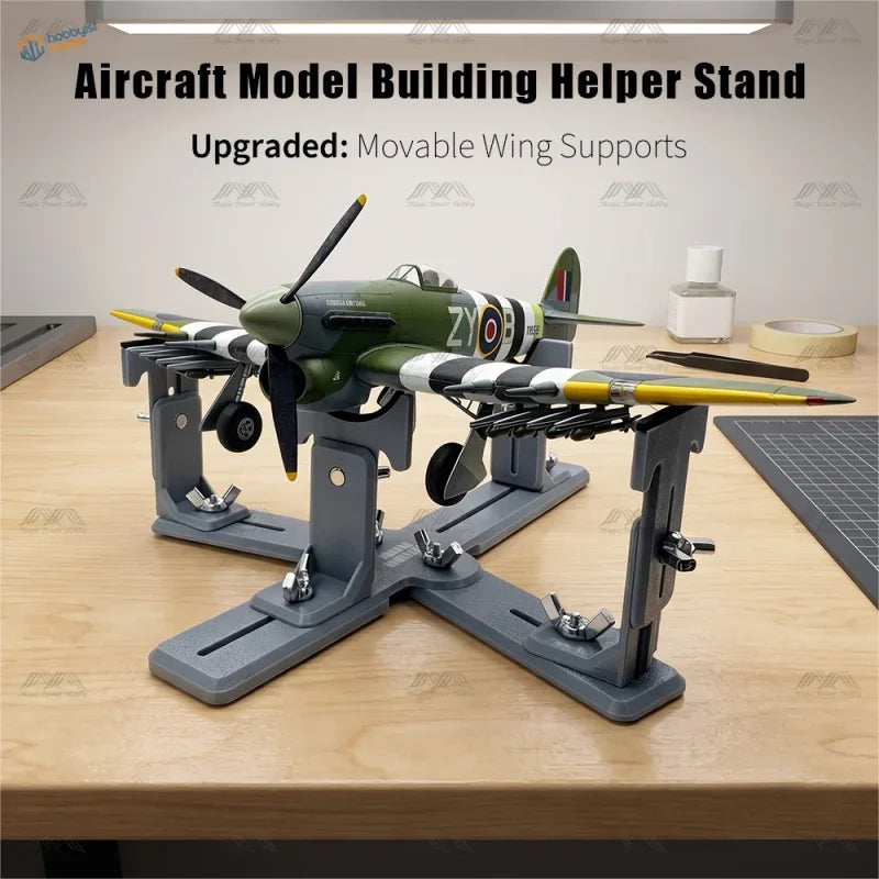 Leungs workshop upgraded model aircraft holder in gray metal displaying olive green and yellow aircraft with striped wings