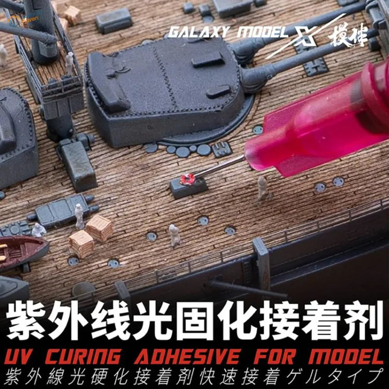 Red-handled rapid-curing UV glue bottle for scale modeling