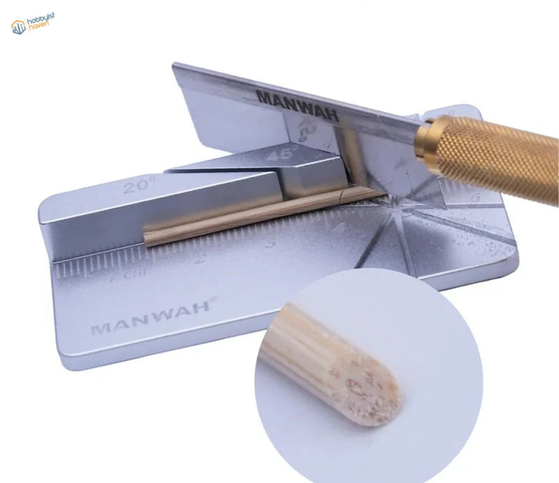 Silver Manwah multi-angle cutting jig with brass-handled saw for precise 20 and 45 degree cuts in model building tools
