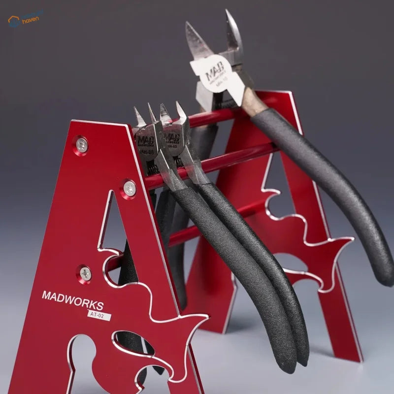 Red metallic A-shaped metal holder for pliers with black-handled modeling tools