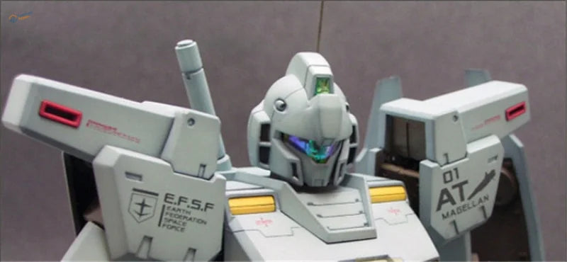 Gray Gundam model with E.F.S.F. insignia and metallic color sticker accents