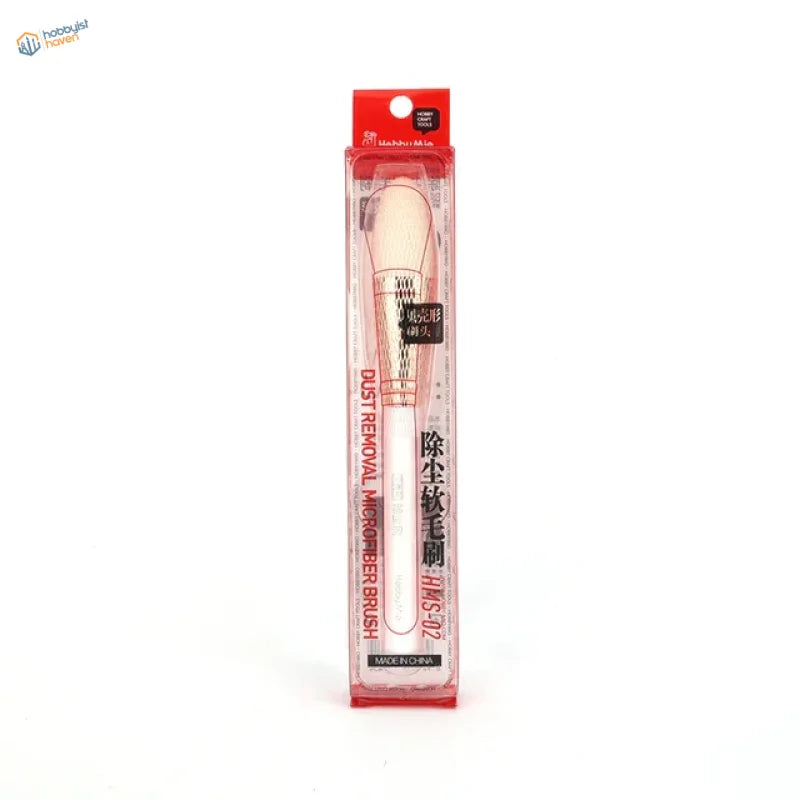 Pink and white microfiber dust removal brush with rose gold handle in packaging