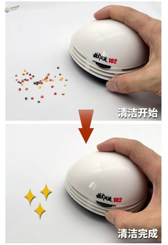 Mini desktop vacuum cleaner white egg-shaped with red branding