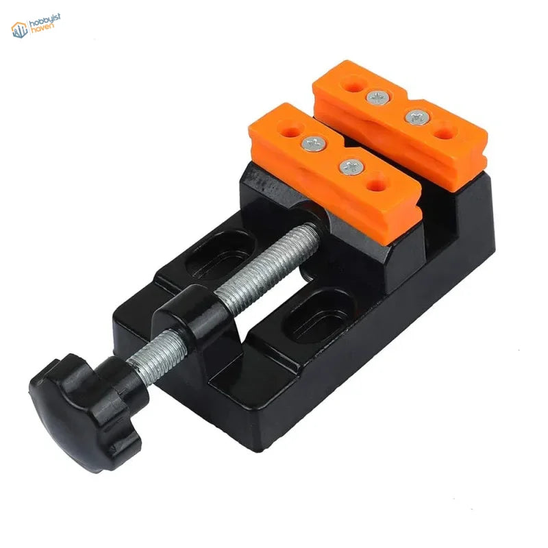 Black and orange mini table vise with threaded screw and plastic handle