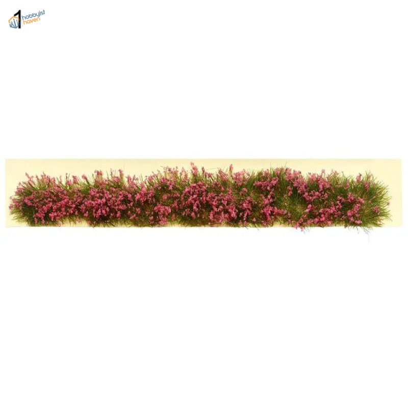 Dense pink miniature flower clusters artificial hedge with green foliage